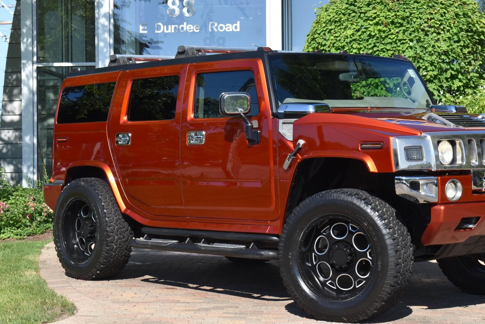 Orange Hummer H2 Truck